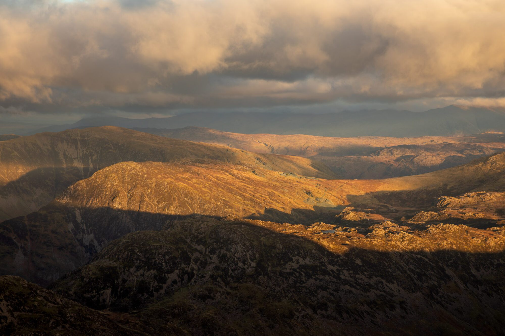 Winter sunset catching the mountains surrounding Pillar in the Lake District.