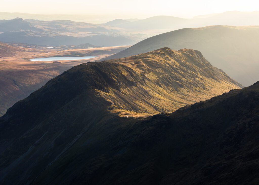 A view of Yewbarrow during a golden winter sunset in the Lake District.
