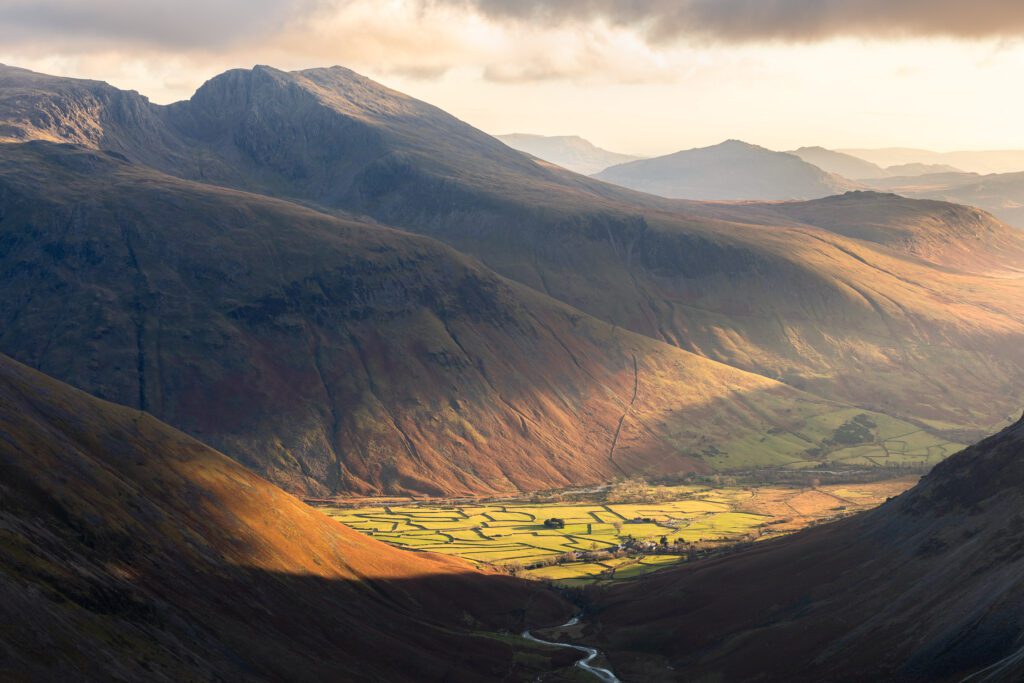 A breathtaking landscape photograph of Mosedale Valley and Wasdale Head during sunset in the Lake District.