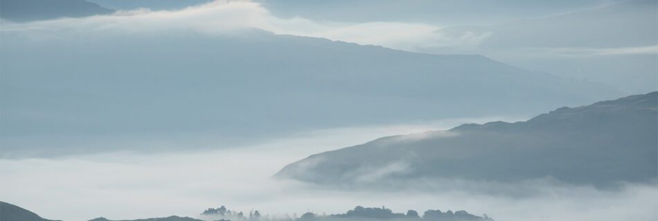 Lake District landscape photograph of a temperature inversion along Great Langdale Valley at sunrise.