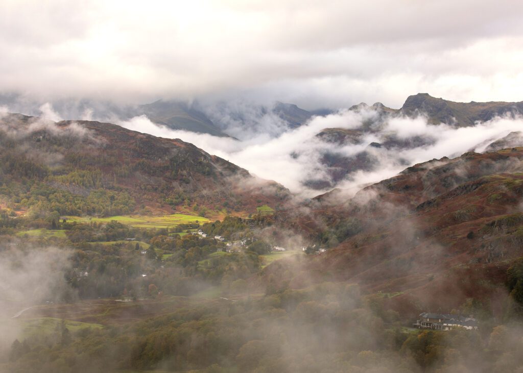 Landscape photography featuring a spectacular Lake District scene captured during Autumn 2023. A breathtaking cloud inversion swallowed up the area surrounding Loughrigg Fell. Photographed with a Canon 5D MK4 and 24-70mm F2.8L lens.