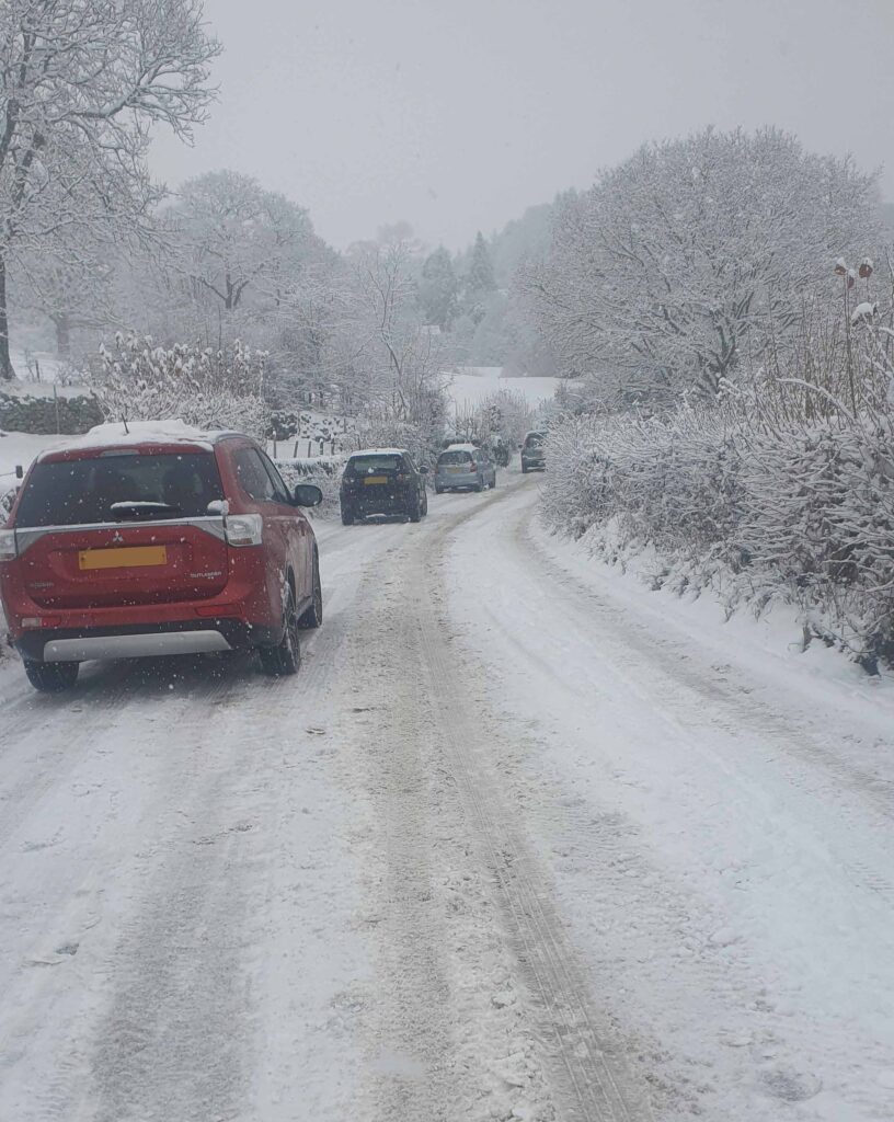 Stranded cars along the A593 during heavy snow in the Lake District. 2nd December 2023.