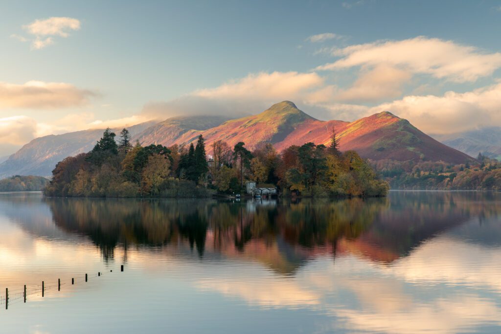 A view of Catbells during an autumn sunrise at Crow Park on Derwentwater, Keswick.