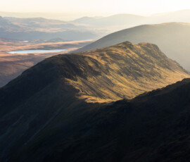 A view of Yewbarrow during a golden winter sunset in the Lake District.