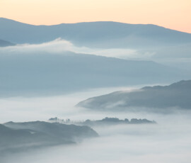 Lake District landscape photograph of a temperature inversion along Great Langdale Valley at sunrise.
