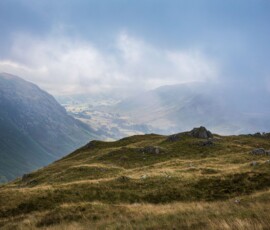 The Band Lake District landscape photography from Bowfell during blue hour near The Band. Mickleden Valley is briefly visible during a gap in the clouds during the later stages of blue hour.