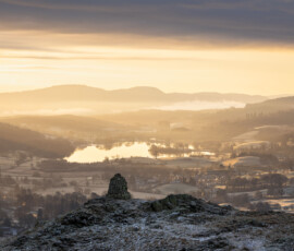 A breathtaking sunrise over Hawkshead and Tarn Hows in the Lake District